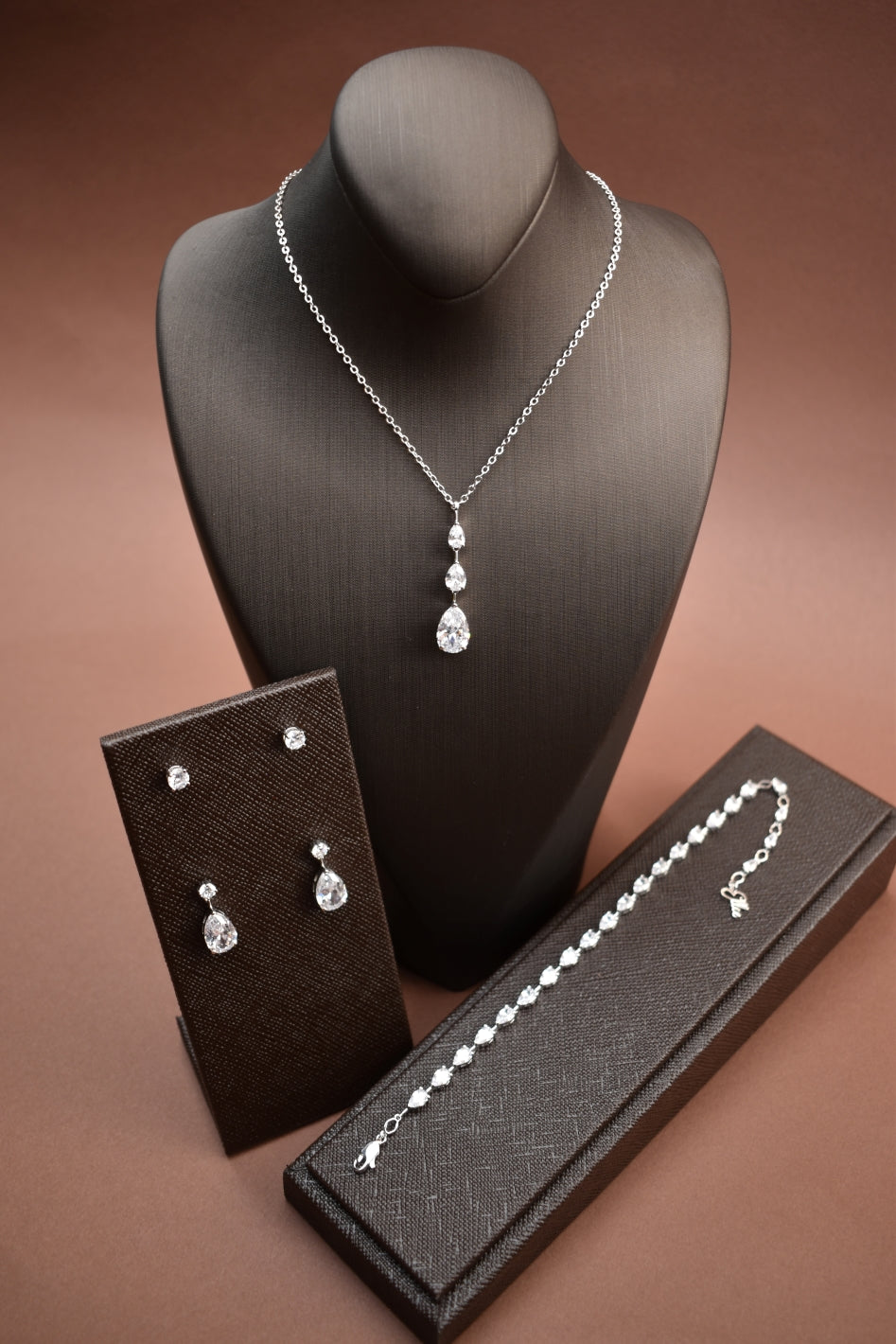 Dala Jewelry Set with white crystal on bust silver tone